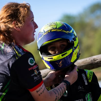Pre-race helmet check in the pits